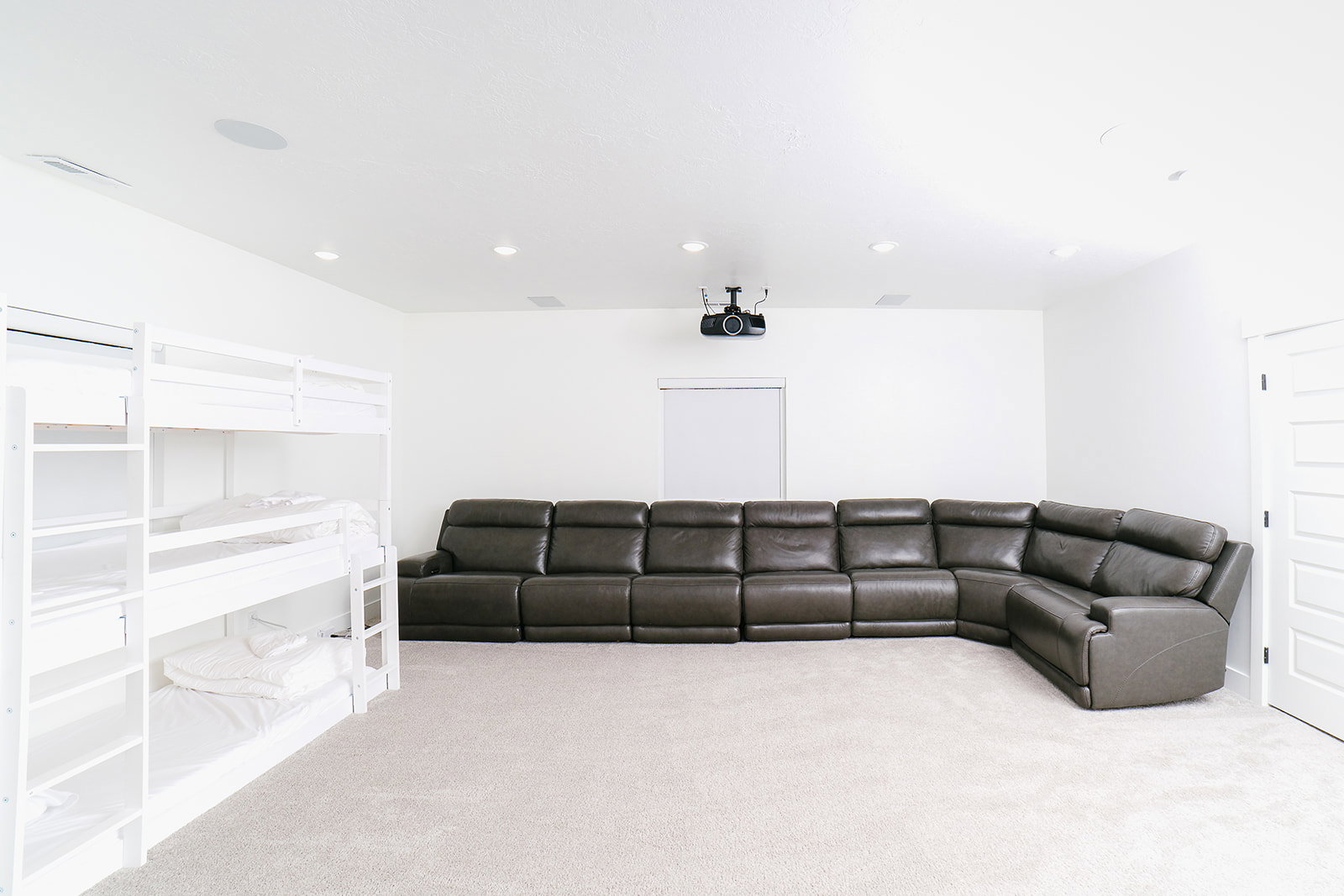 Carpeted cinema room featuring recessed lighting