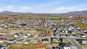 View of property location with nearby suburban area and a mountainous background