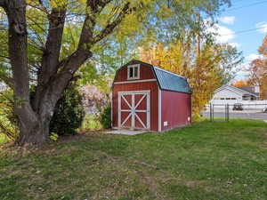 View of shed with a gate