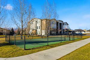 View of basketball court with a tennis court