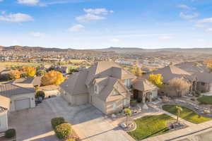 Aerial view of residential area featuring mountains