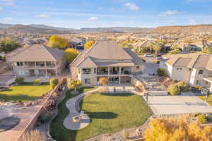 Aerial view of residential area featuring a mountainous background