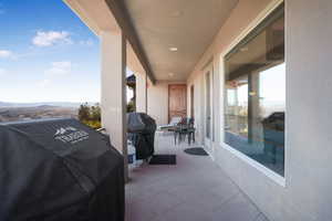 View of patio / terrace featuring a grill and a mountain view