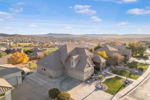 Aerial view of residential area featuring mountains