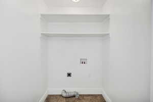 Laundry room featuring hookup for an electric dryer and hookup for a washing machine