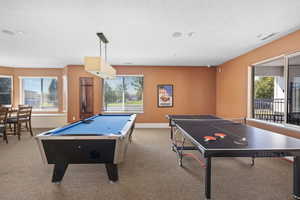 Playroom with a textured ceiling