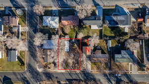 Aerial perspective of suburban area with property parcel outlined