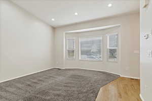 Unfurnished room featuring recessed lighting and light wood-style floors