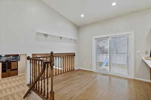 Unfurnished dining area featuring healthy amount of natural light, recessed lighting, and light wood-style floors