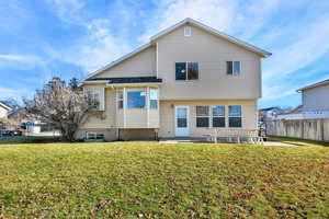 Patio area overlooking the ample yard space, full sprinkler system and shed included. Fully fenced as well.