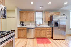 Open plan kitchen area, stainless steel appliances