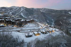 Snowy aerial view with a mountain view