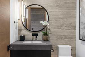 Bathroom with vanity and toilet