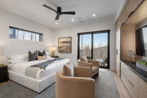 Bedroom with access to outside, a ceiling fan, light wood-type flooring, and recessed lighting