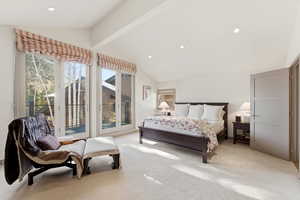 Bedroom featuring light carpet, recessed lighting, and access to exterior