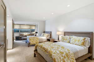 Carpeted bedroom featuring recessed lighting