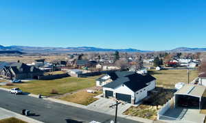 Aerial view of residential area featuring mountains