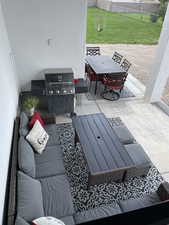 View of patio / terrace featuring area for grilling and outdoor dining space