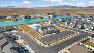 Aerial perspective of suburban area featuring a water and mountain view