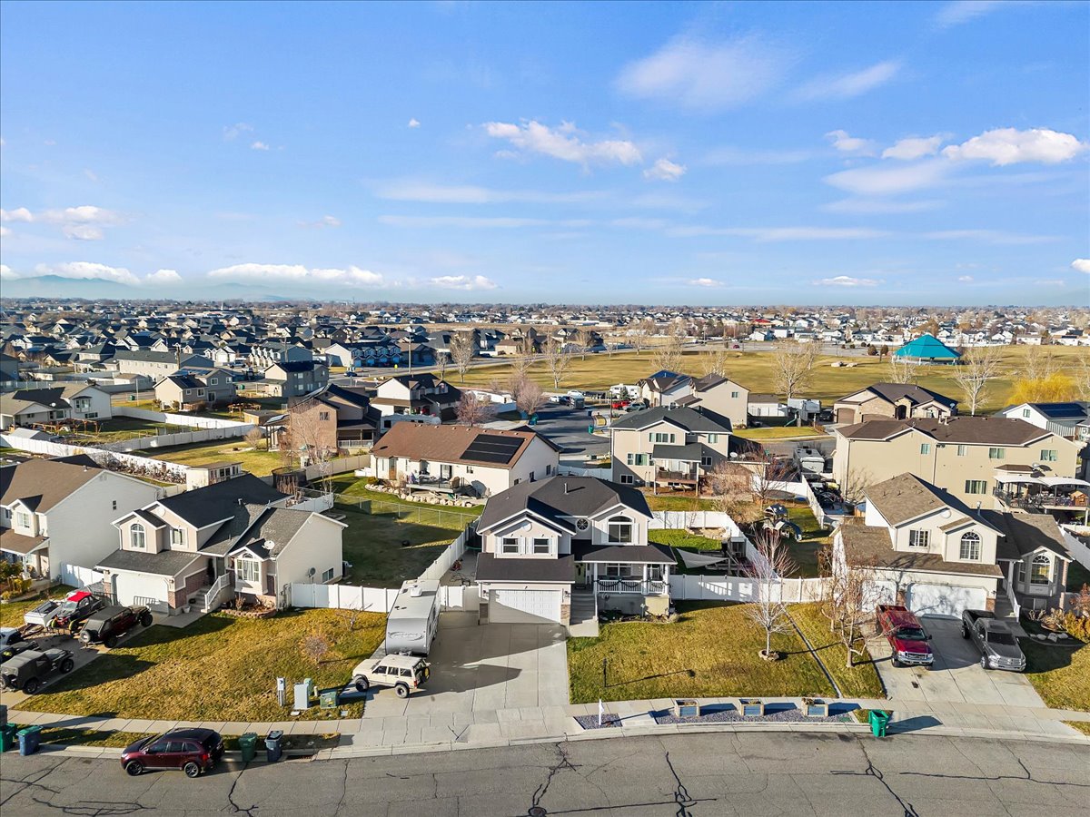 Aerial perspective of suburban area close to park