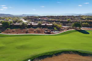 View of home's community featuring a mountain view and view of golf course