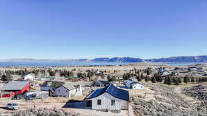 View of mountain backdrop with nearby suburban area