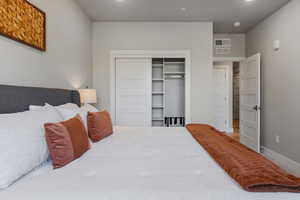 Bedroom featuring a closet and recessed lighting
