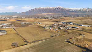 Aerial overview of property's location with mountains and rural landscape