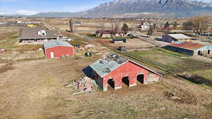 View of subject property with a mountain backdrop