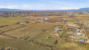Aerial view of property's location featuring mountains and rural landscape
