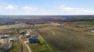 Aerial overview of property's location featuring rural landscape
