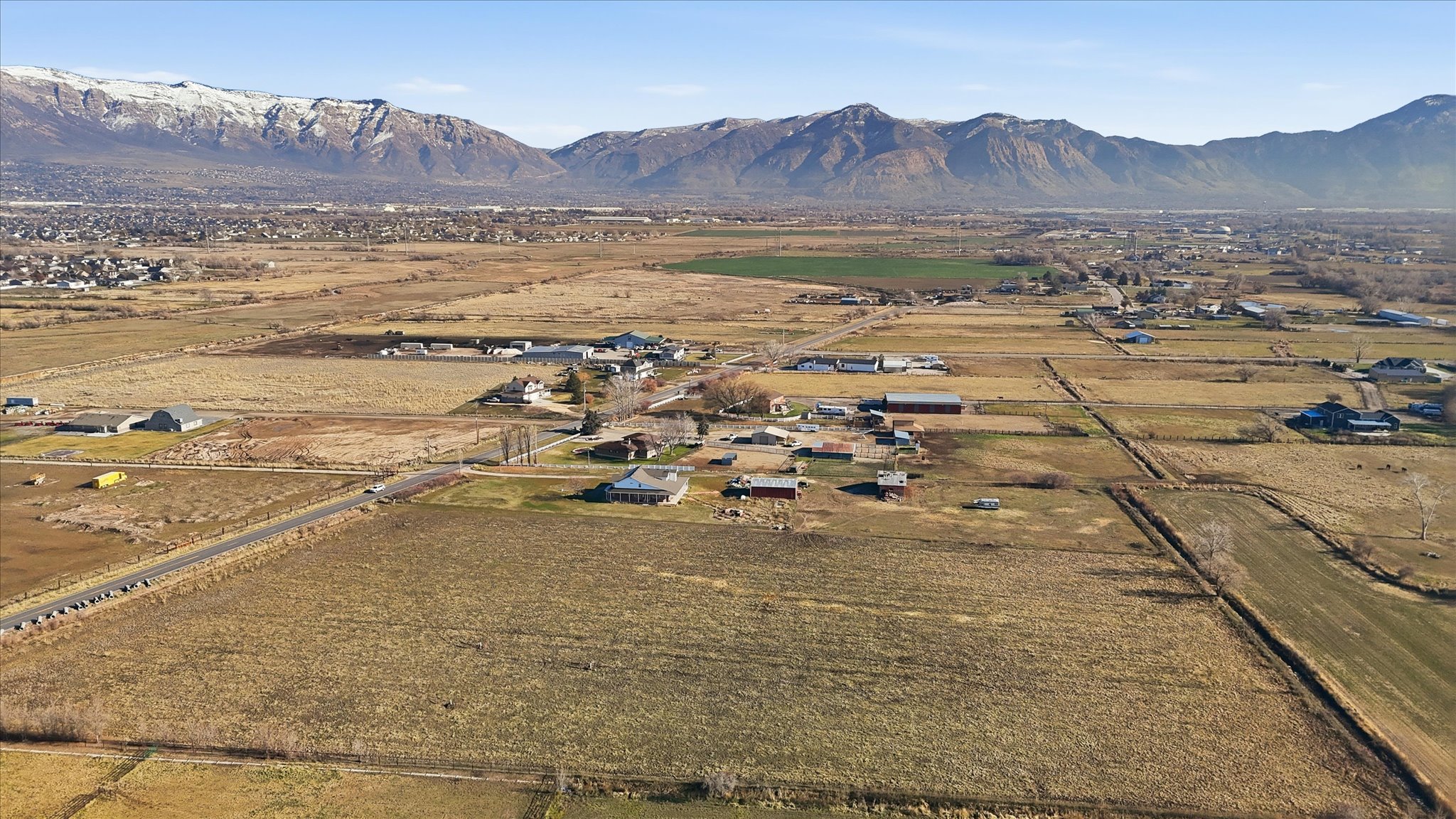 Aerial view of property's location featuring mountains and rural landscape