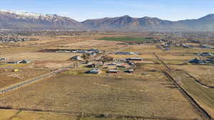 Aerial view of property's location featuring mountains and rural landscape