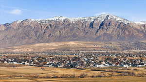 View of mountain backdrop with nearby suburban area