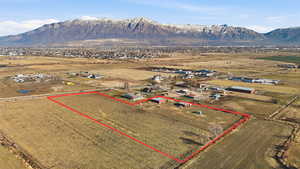 View of rural area with property parcel outlined and a mountainous background