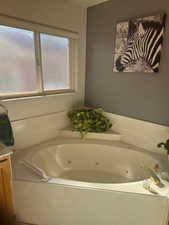 Bathroom with a whirlpool tub
