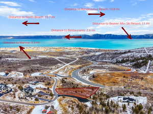 Snowy aerial view with a mountain view