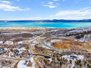 Snowy aerial view featuring a mountain view