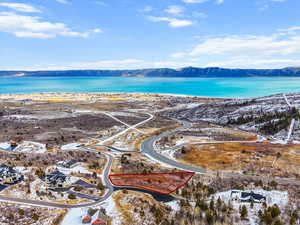 Snowy aerial view with a mountain view