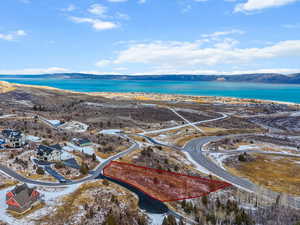 Snowy aerial view featuring a mountain view