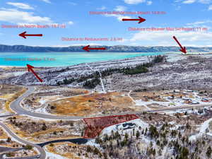 Snowy aerial view with a mountain view