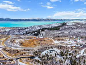 Snowy aerial view with a mountain view