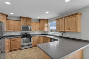 Lots of kitchen counter space and cabinets.