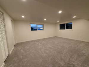 Basement featuring carpet and recessed lighting