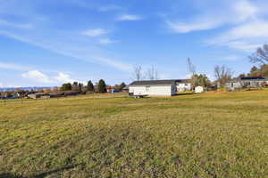 View of yard featuring a view of rural / pastoral area