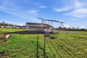 View of yard featuring a playground