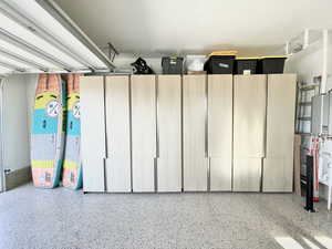 Garage featuring water heater