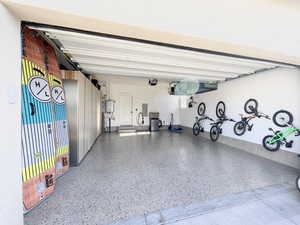 Garage featuring electric panel