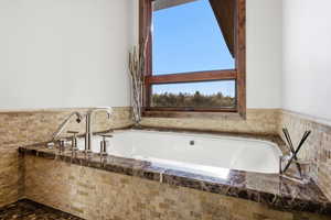 Full bath with a bath