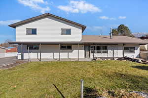 View of front of property featuring a shingled roof